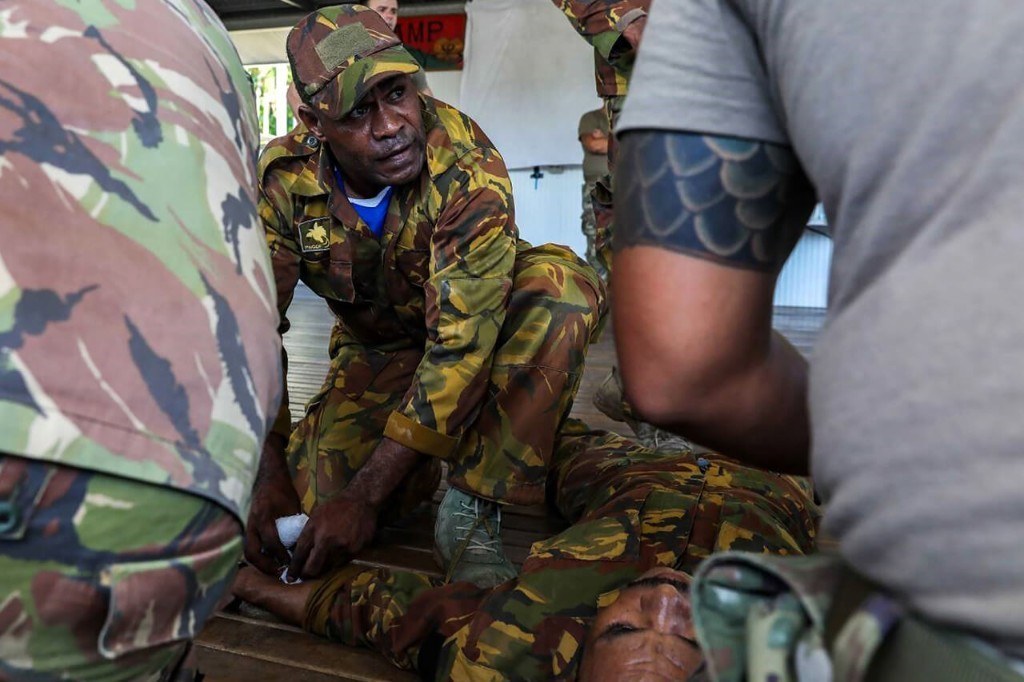 Soldiers working together on disaster relief training