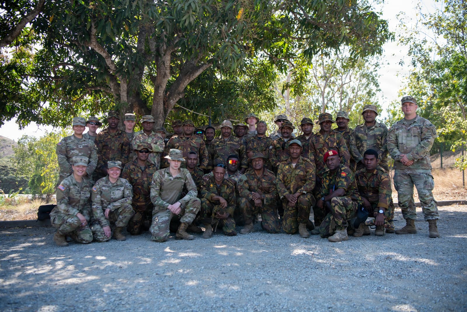 U.S. Army Soldiers and members of the Papua New Guinea Defence Force pose for a group photo during Tamiok Strike 26 at Murray Barracks in Port Moresby, Papua New Guinea
