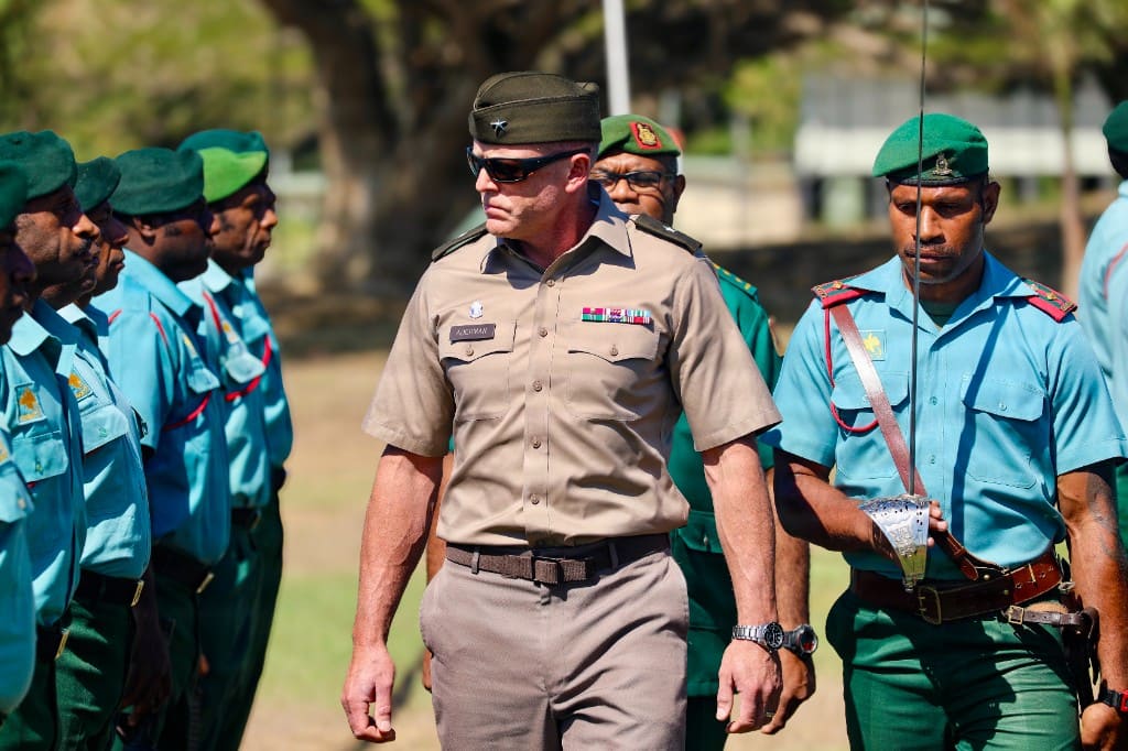 U.S. Army Brig. Gen. Brion J. Aderman walks past a formation of Papua New Guinea Defence Force soldiers during the opening ceremony for Exercise Tamiok Strike 26 at Murray Barracks